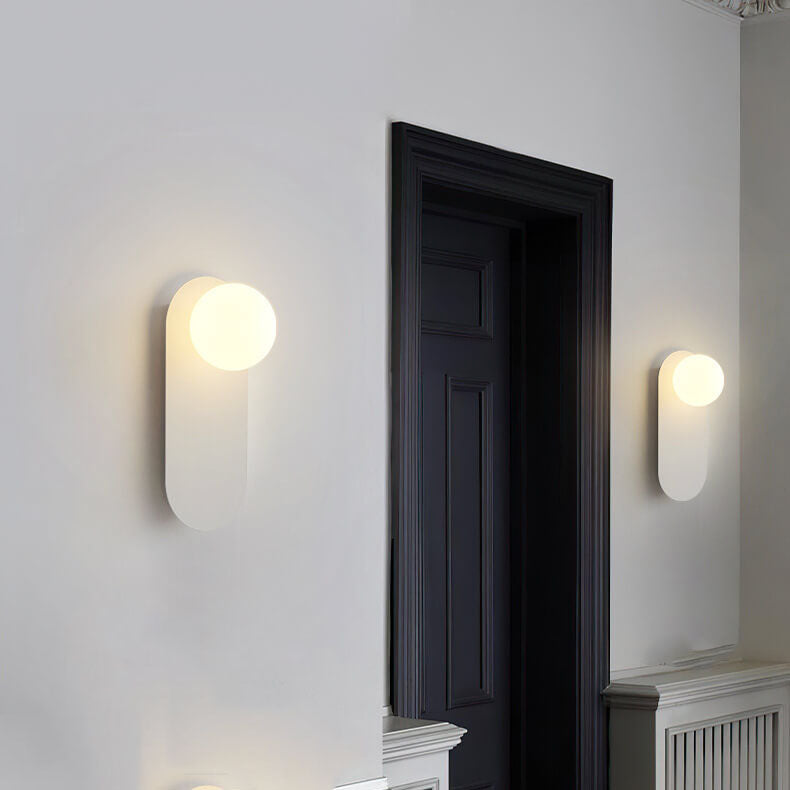Elegant Modern Wall Light | Glass Globe & Metal Design 4